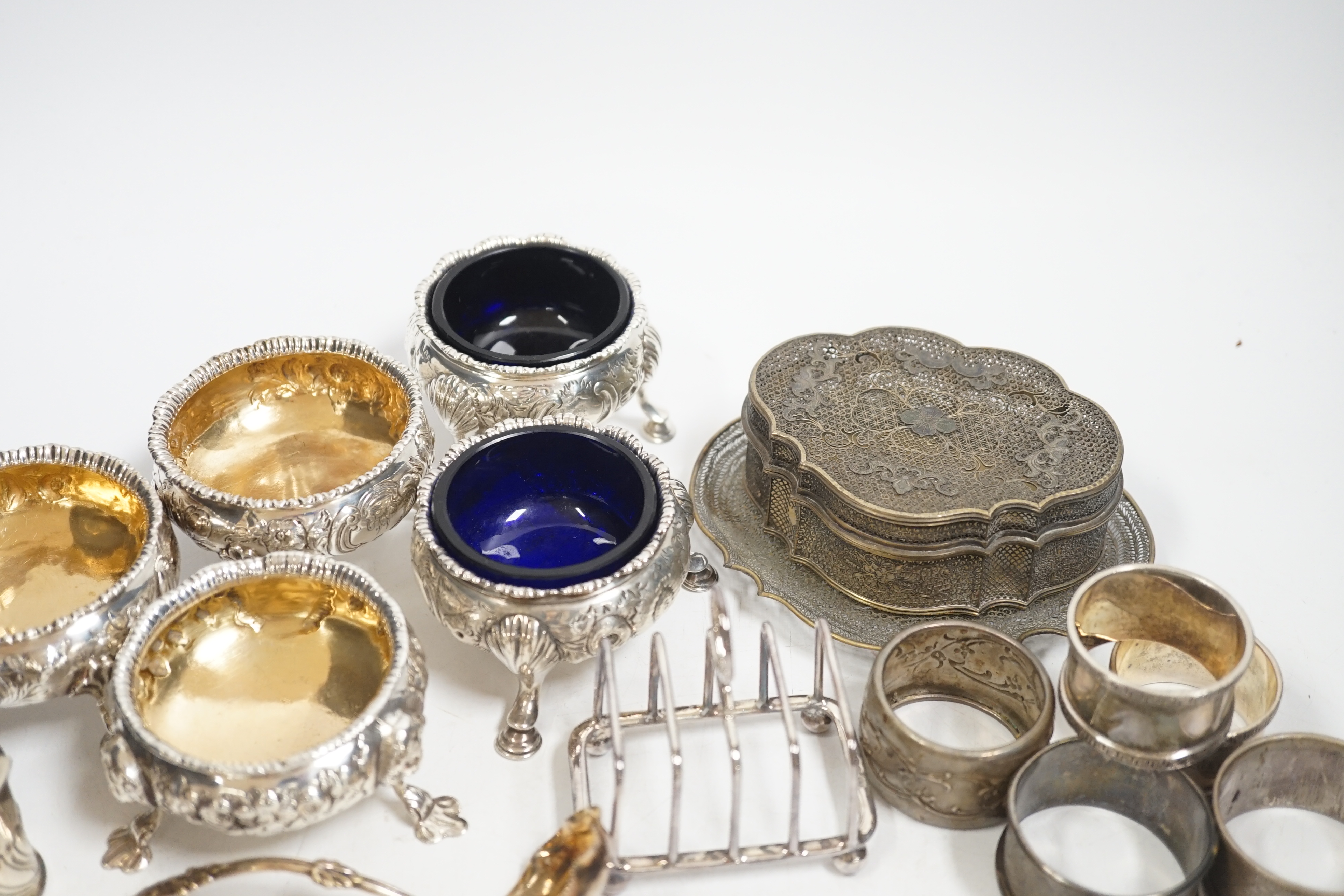 Five assorted Georgian silver bun salts and sundry small silver wares including napkin rings, flatware and white metal items.